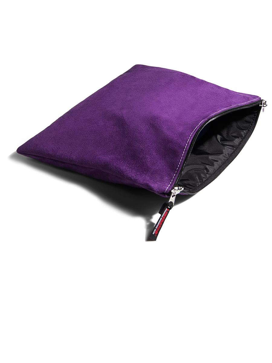 Liberator Zappa Toy Satchel in purple open showing black interior and zipper on white background
